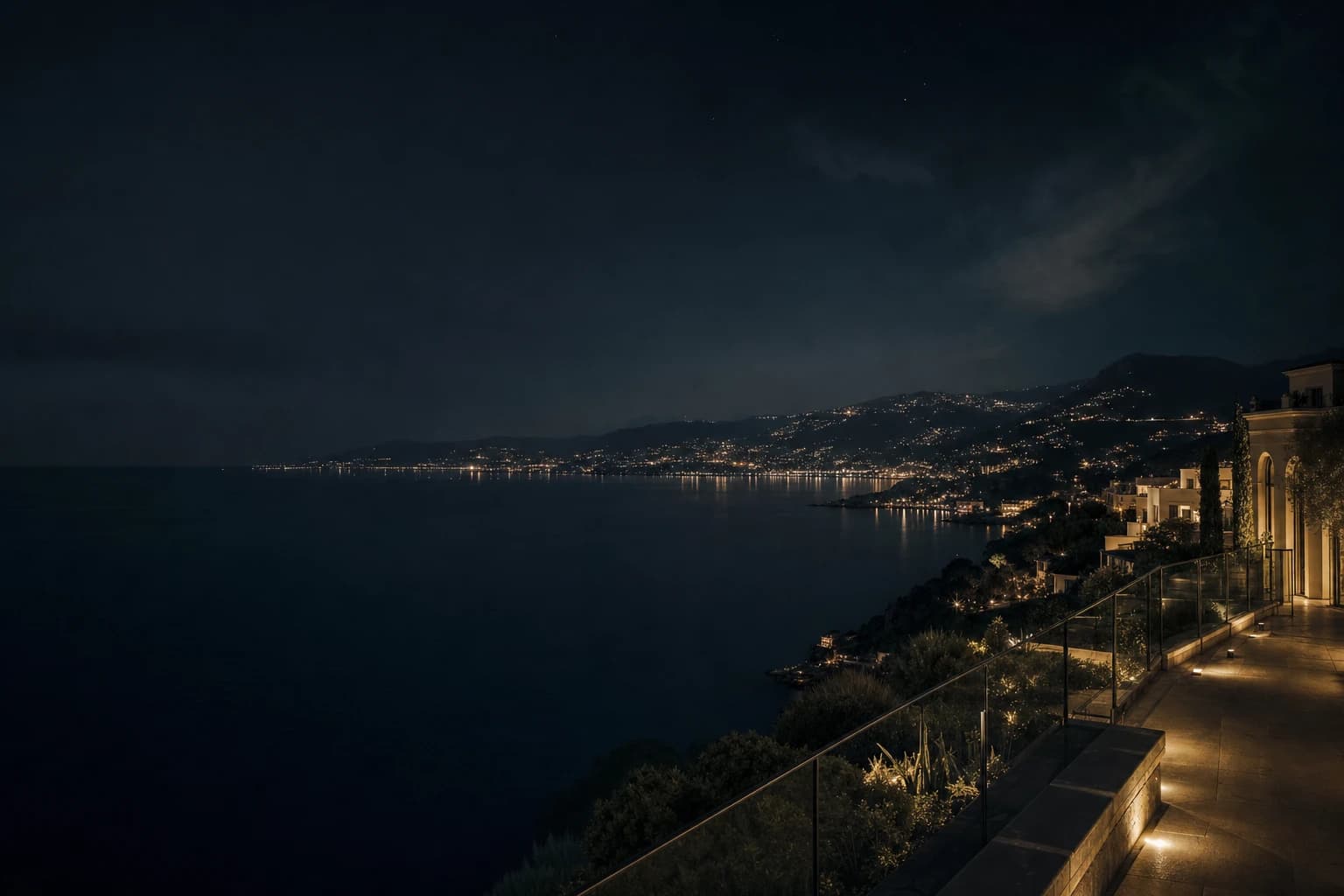A quiet coastline illuminated after dark